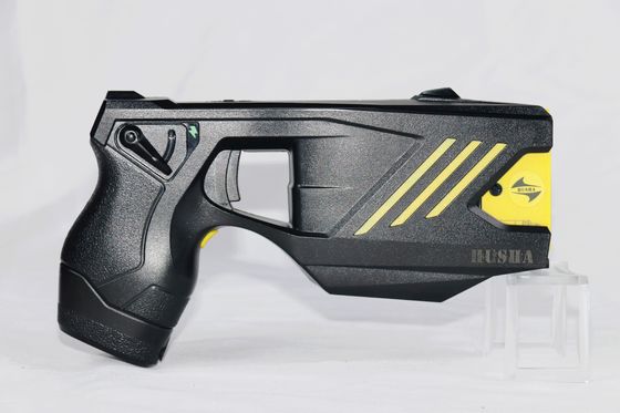 acheter Pistolet paralysant à double cartouche HUSHA TX200P avec étanchéité IP57 et tension de sortie 55 ± 5KV pour une utilisation tactique fabrication en ligne